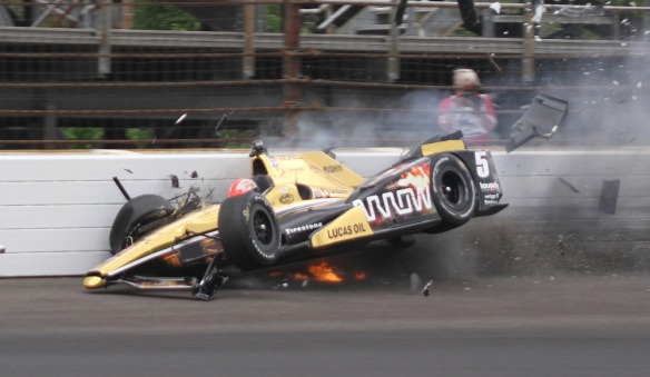 James Hinchcliffe, of Canada, hits the wall in the third turn during practice for the Indianapolis 500 auto race at Indianapolis Motor Speedway in Indianapolis, Monday, May 18, 2015.  (Jimmy Dawson/The Indianapolis Star via AP) ORG XMIT: ININS101