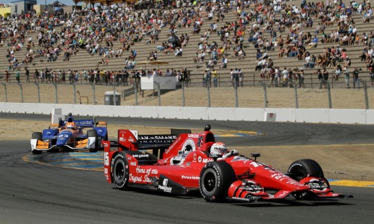 Graham Rahal, right, and Charlie Kimball (83) compete during the IndyCar Grand Prix of Sonoma auto race Sunday, Aug. 30, 2015, in Sonoma, Calif. (AP Photo/Eric Risberg) ORG XMIT: CAER108