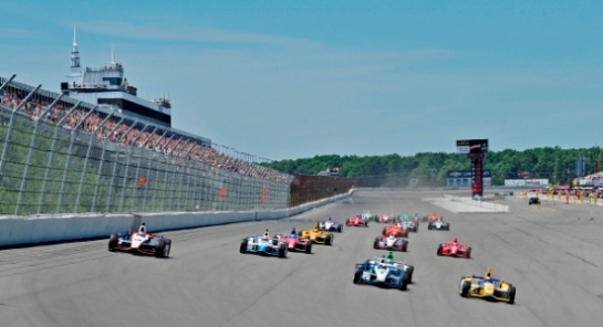 LONG POND, PA - JULY 6, 2014: The Verizon IndyCar Series Pocono INDYCAR 500 fueled by Sunoco race is held at Pocono Raceway in Long Pond, PA on July 6, 2014 (2014 pixelcrisp)